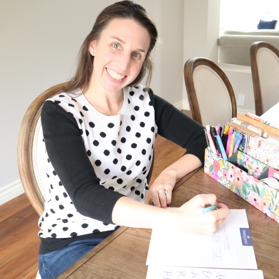 happy mom heather kirwan taking care of her mental health writing in a journal