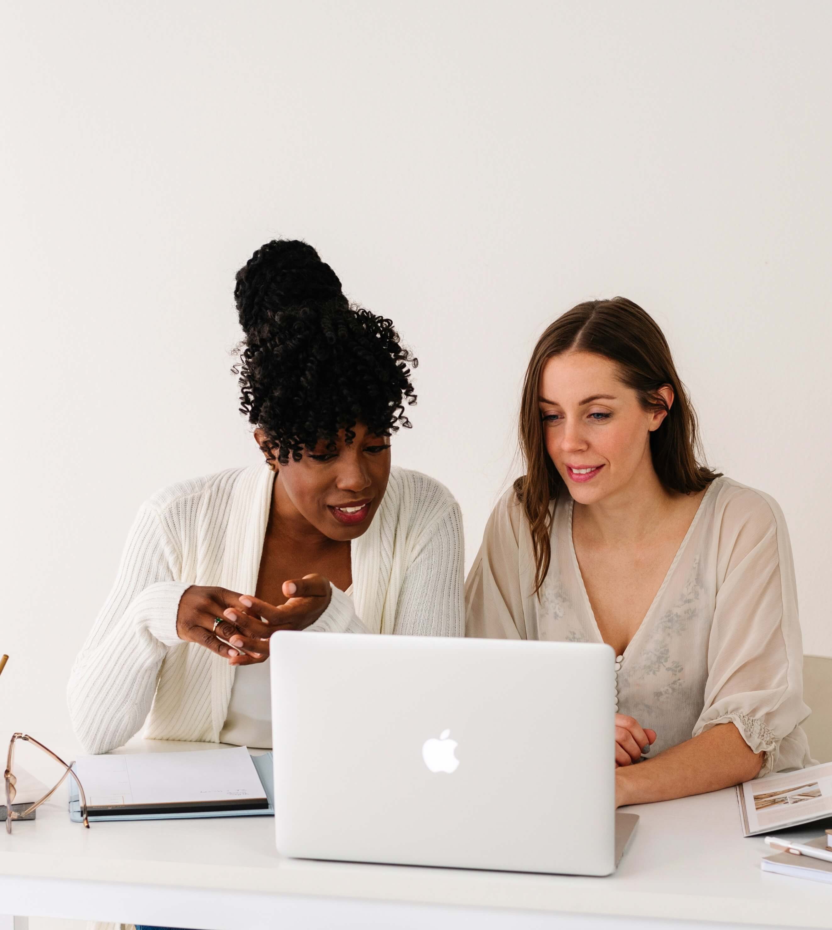 Two women building a website