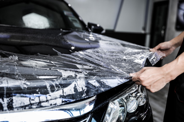 STEK paint protection film being installed